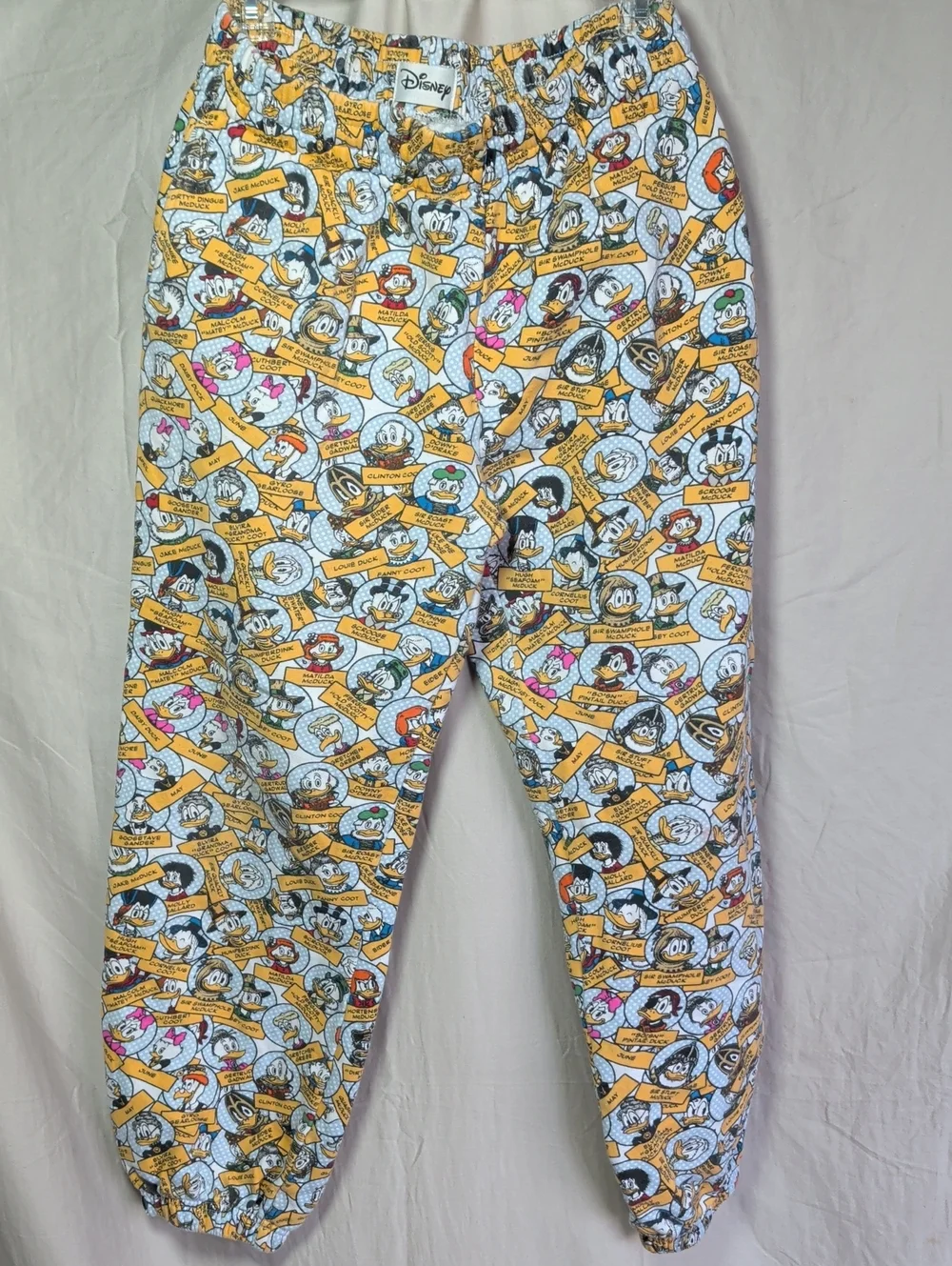 Disney White Jogger Pants with Yellow Character Print